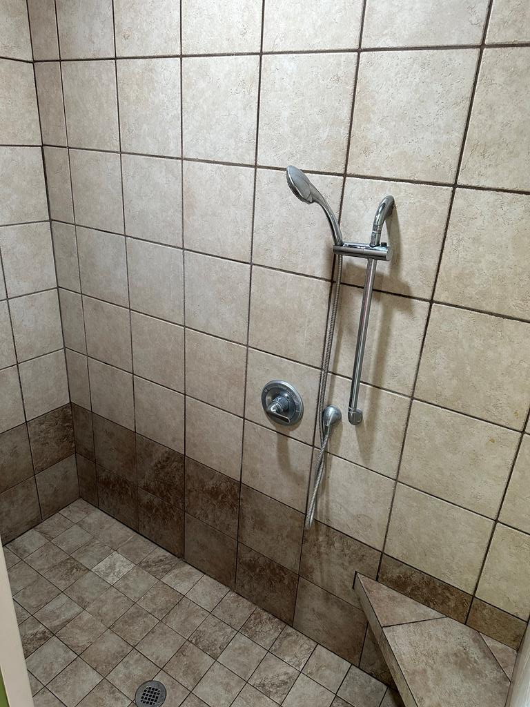 Primary Bedroom Bathroom with Walk-In Tile Shower