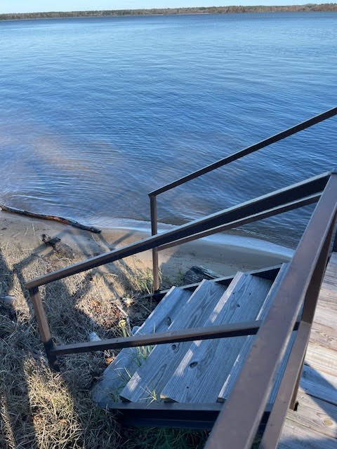 Stairs off of dock to the beach